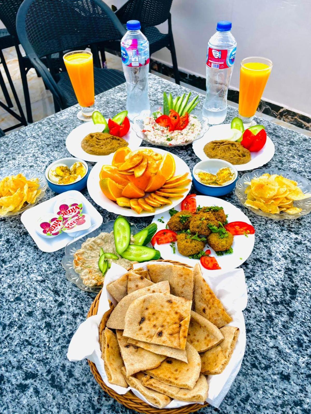 Momen Pyramids Inn Kafrat al Jabal Exterior photo